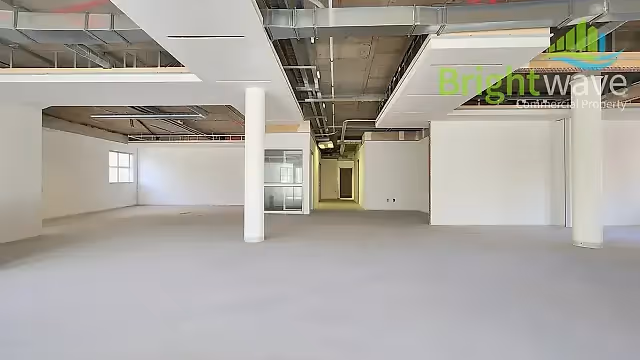 404 m2 office to let at Waterford House in Century City, open plan interior.