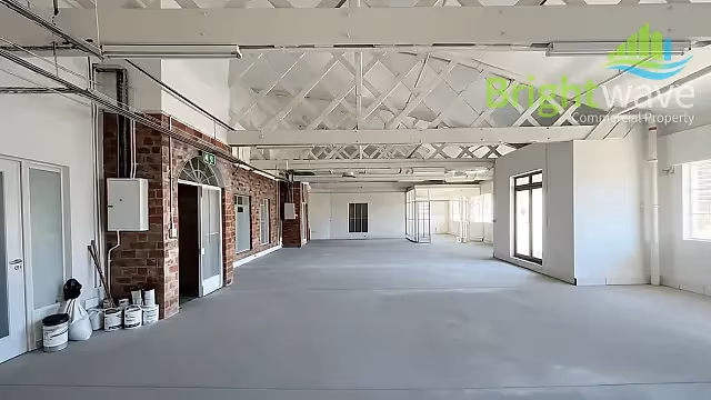 164 m2 office to let at Woodlands House in Woodstock, open plan interior.