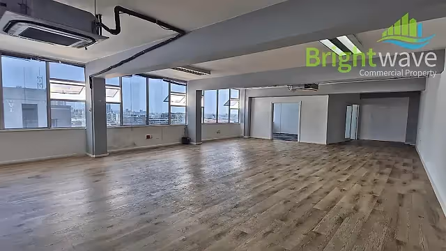 250 m2 office to let at 172 De Waal House in Woodstock, open plan interior.