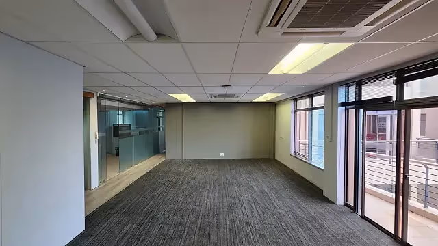 137.5 m2 office to let at The Cliffs in Tyger Valley, open plan interior.